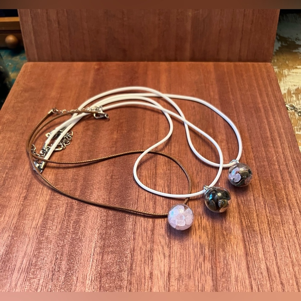 Hand filled glass globe pendants with assorted crystal chips. Set of 3.